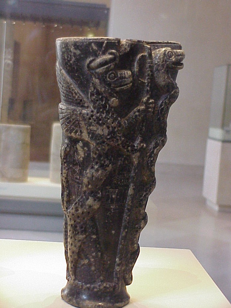 Photo of Libation Cup taken at the Louvre
 in 1999 by Chris Tolley